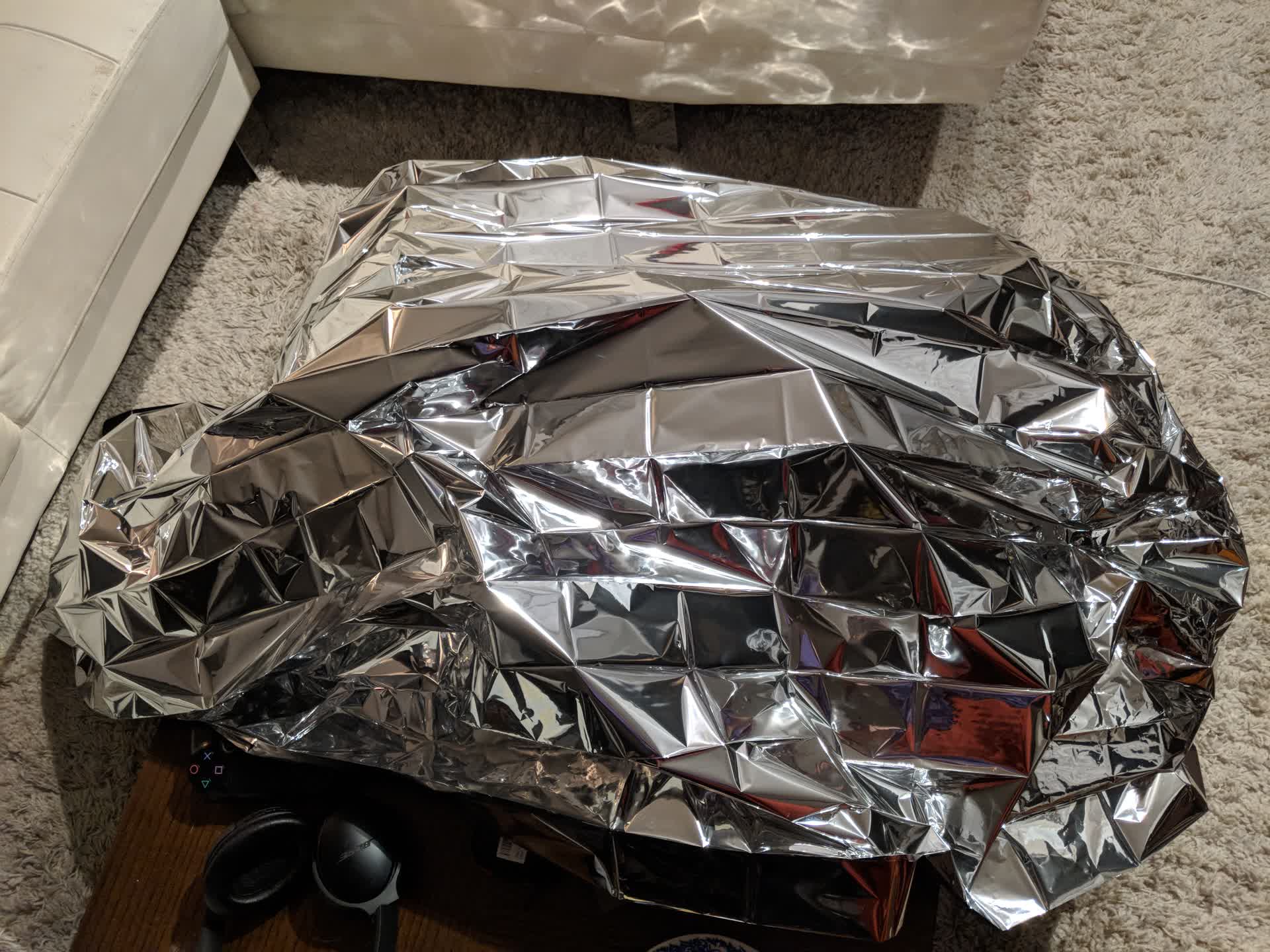 I covered the laptop in a silver mylar blanket. I don't think it made anything more secure, but it made me feel safer.